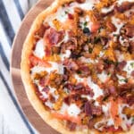 This Butternut Squash, Bacon, Goat Cheese Pizza comes complete with sweet butternut squash, bacon, three yummy cheeses (including my favorite - goat cheese) and the most phenomenal crispy cornmeal crust.