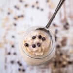 overnight oatmeal topped with chocolate chips and served in a mason jar