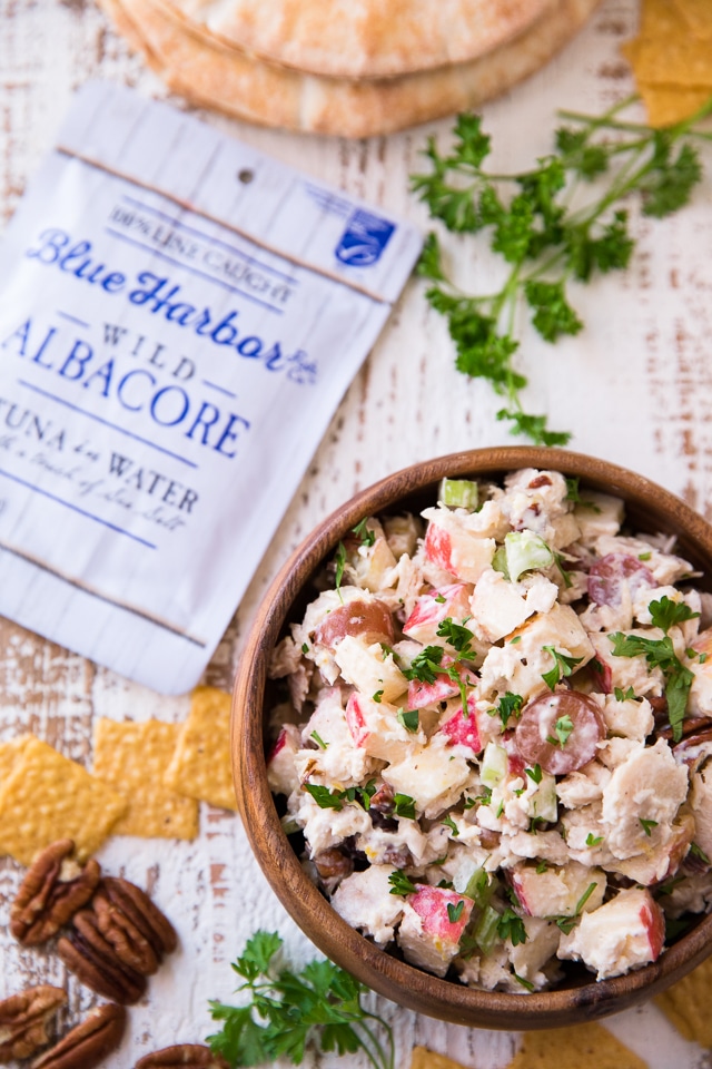 Looking for a fun healthy lunch idea? Well, I’ve partnered with Blue Harbor Fish Co to bring you these delicious Waldorf Tuna Salad Pitas that are light and fresh, full of flavor and only take about 5 minutes to make!