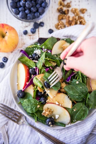 This Heart Healthy Blueberry Spinach Salad is a light and refreshing salad completely loaded with good stuff: sweet apple slices, blueberries, feta cheese, walnuts, fibrous heart healthy spinach and tossed in a flavorful balsamic vinegar.