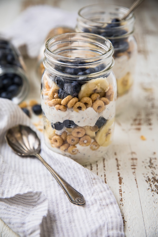 Say "goodbye" to boring breakfasts! These Make-Ahead Blueberry Banana Breakfast Parfaits taste like a decadent dessert... for breakfast! Make them the night before or in a matter of minutes in the morning. Perfect as a morning meal or even a snack! 