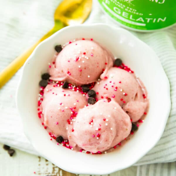 What if I told you that you could have a huge bowl full of Strawberry Banana Soft Serve ready in minutes, in the comfort of your own home, and all for under 100 calories per serving? Did I also mention there is no added sugar, it's high in protein, and 100 percent delicious, creamy, and nutritious? Yep, it's true! Be prepared to enjoy ice cream in a whole new way!
