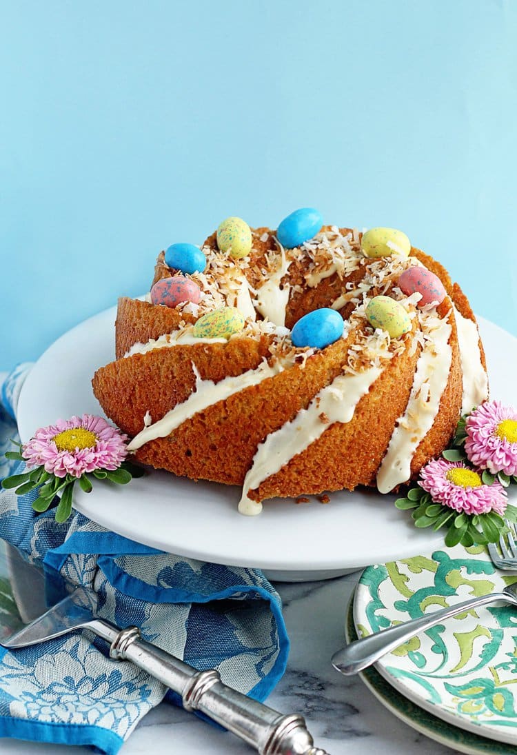 Carrot cake is a classic Easter dessert. This easy carrot cake pound cake has something special. It’s topped with an orange vanilla glaze!