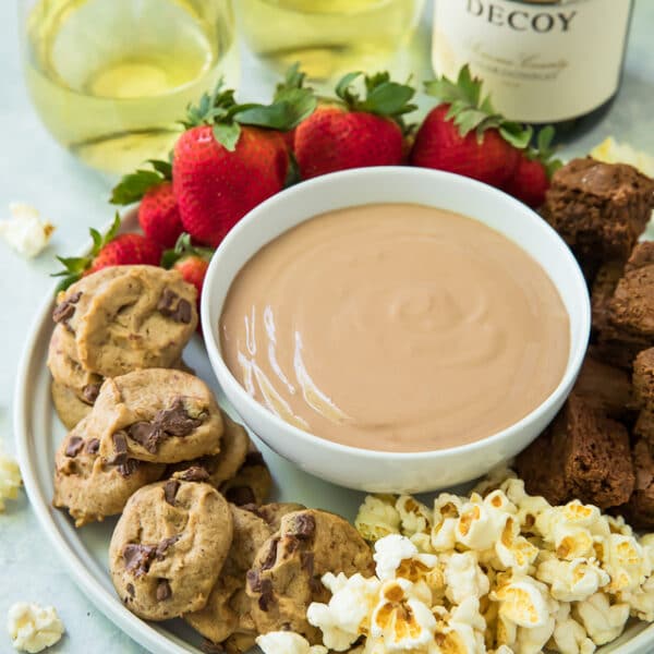 Creamy, silky and delicious, this Chocolate Peanut Butter Dip is an addicting addition to your appetizer or dessert spread!