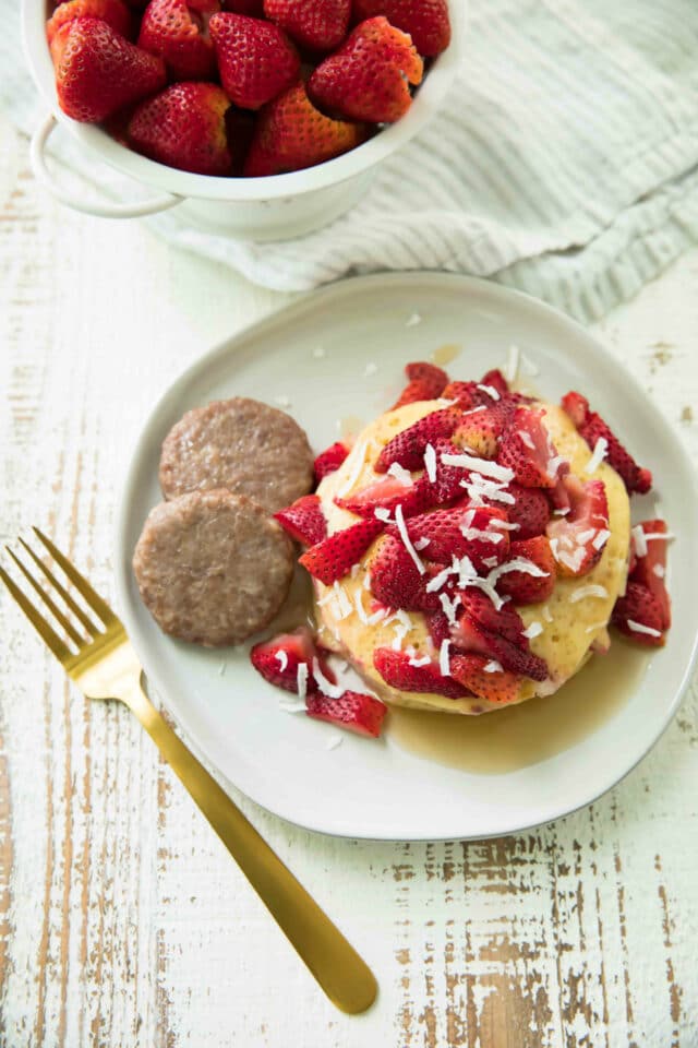 Sheet Pan Pancake Breakfast with Smithfield Hometown Original Fresh Breakfast Sausage and roasted strawberries is very easy to whip up and takes just 20 minutes to bake, giving you more time for morning cartoon snuggles!