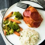 Pizza Stuffed Chicken With Mashed Cauliflower is a complete family-friendly meal with all the delicious flavors of pizza, but with extra protein from the chicken, and none of the empty calories/carbs from the crust!