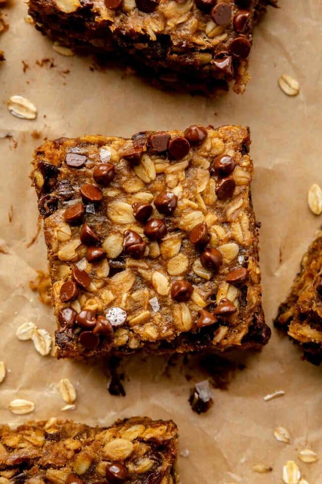 Chocolate chip oatmeal bar on parchment paper.