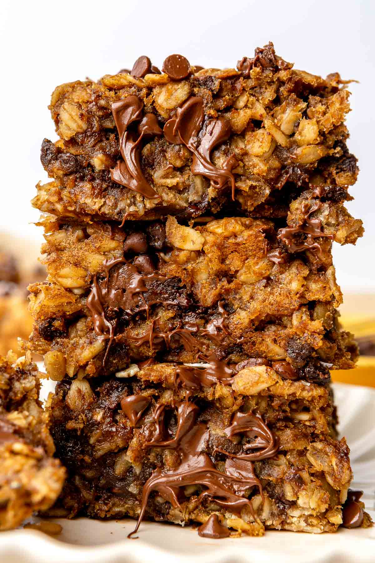 Chocolate chip oatmeal bars stacked.