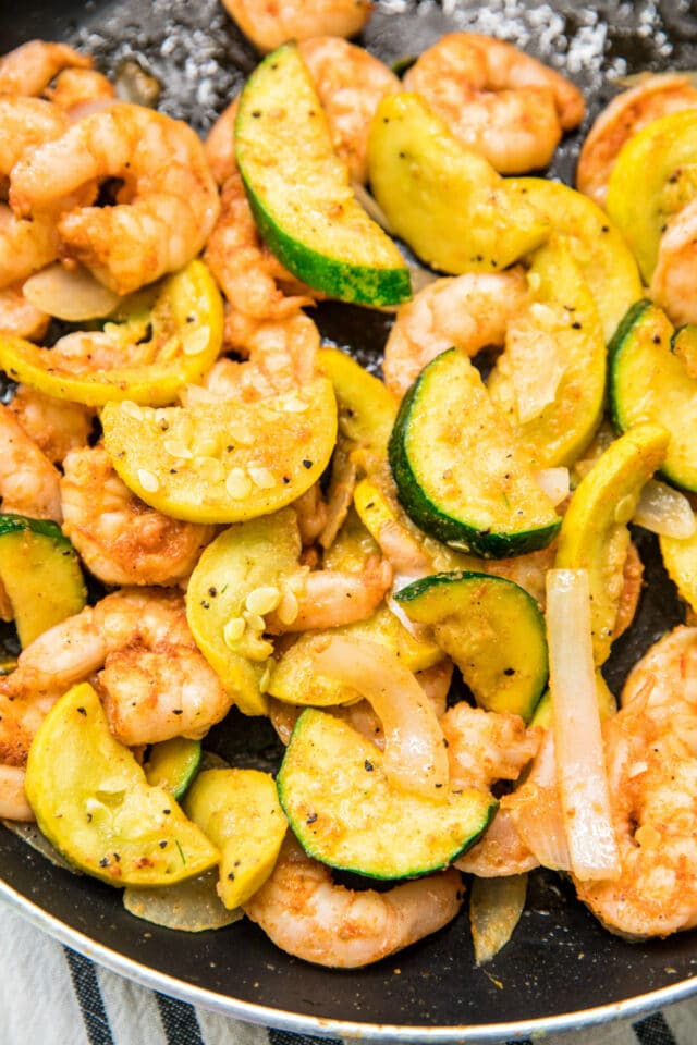 Easy Shrimp Zucchini Squash Skillet cooking in a skillet 