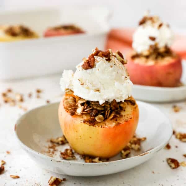 Baked apples with crisp topping and served with vanilla ice cream.