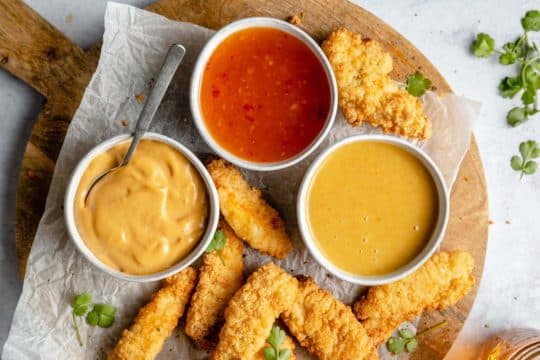 Serving 3 dipping sauces with chicken tenders.