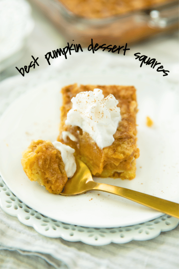 Pumpkin Dessert Squares served on a white plate with a gold spoon