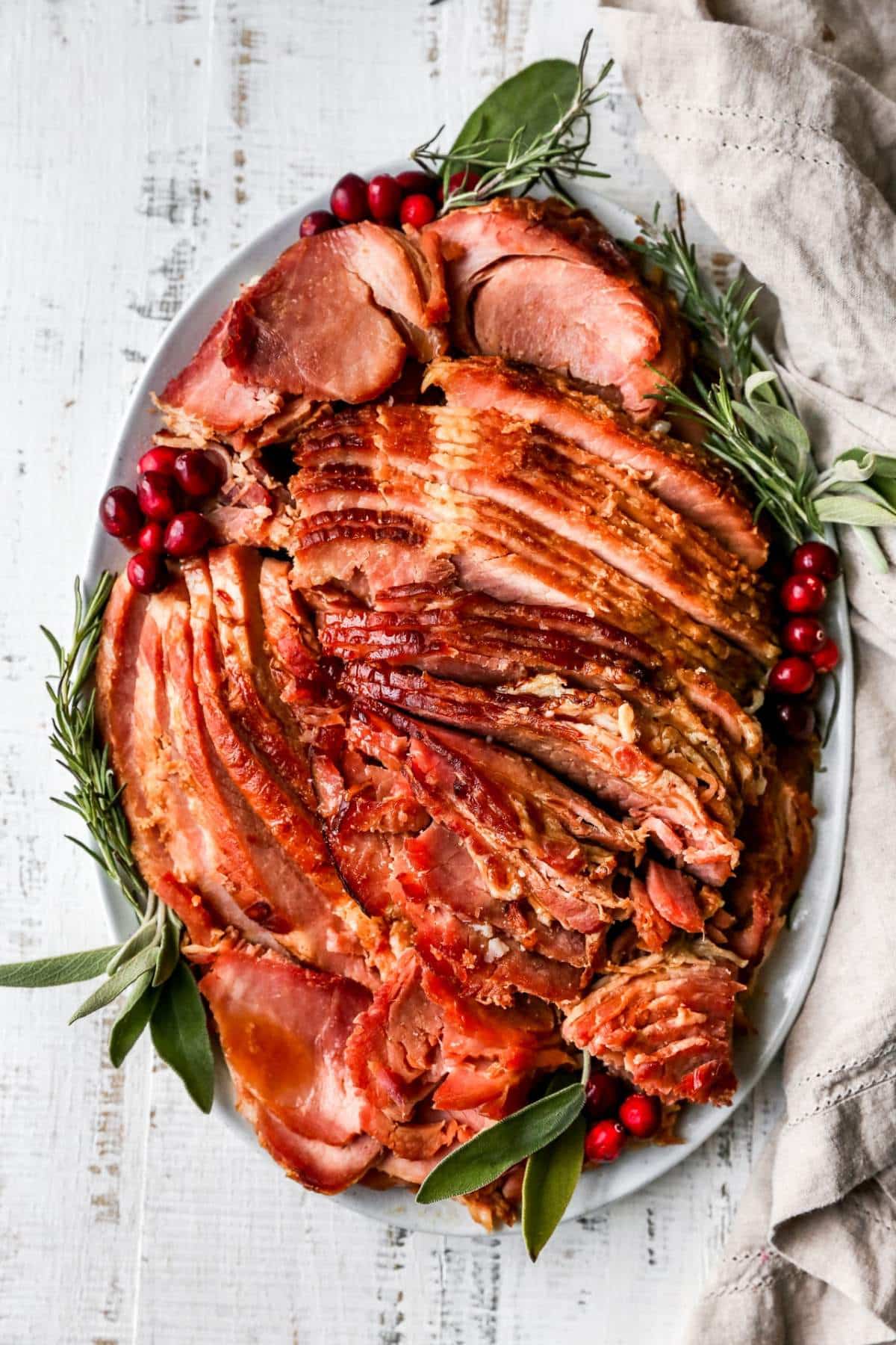 Sliced ham on a serving platter.