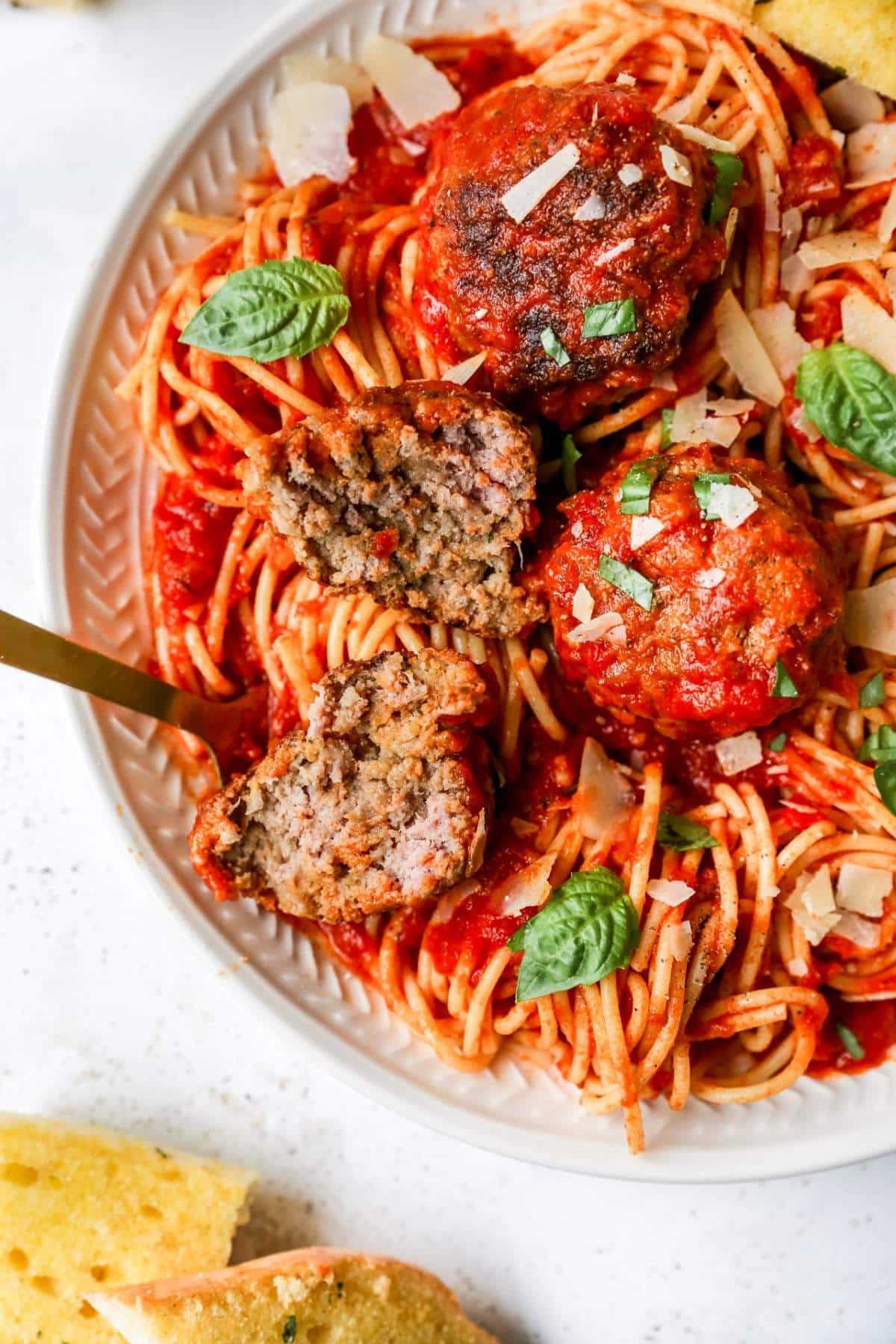 Spaghetti and meatballs in a marinara sauce.