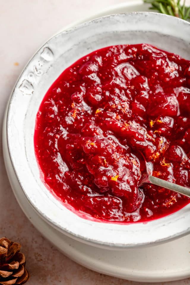 stirring cranberry sauce 