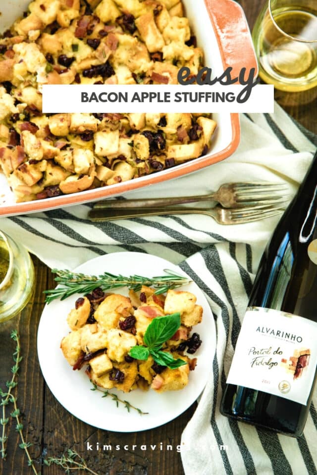 stuffing served on a white plate with a bottle of wine