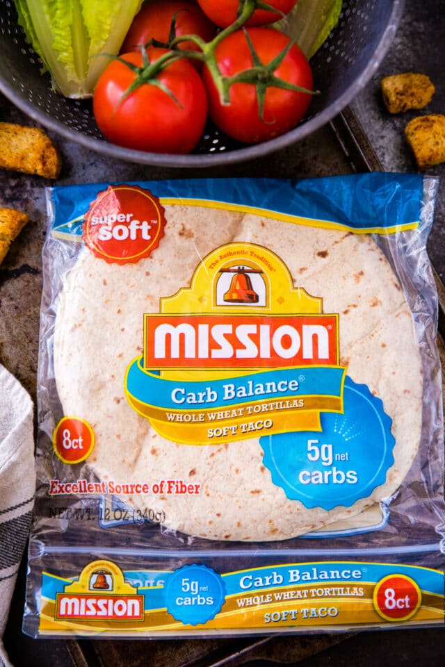 Mission Carb Balance Whole Wheat Tortillas in the package with tomatoes on the vine