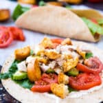 Italian Chicken Wraps on parchment paper