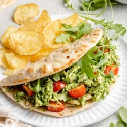 pesto chicken salad served in a pita with potato chips