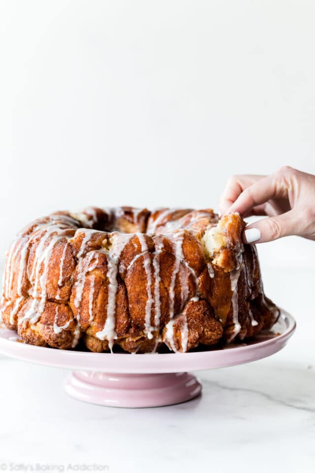 homemade monkey bread on a pink cake stand