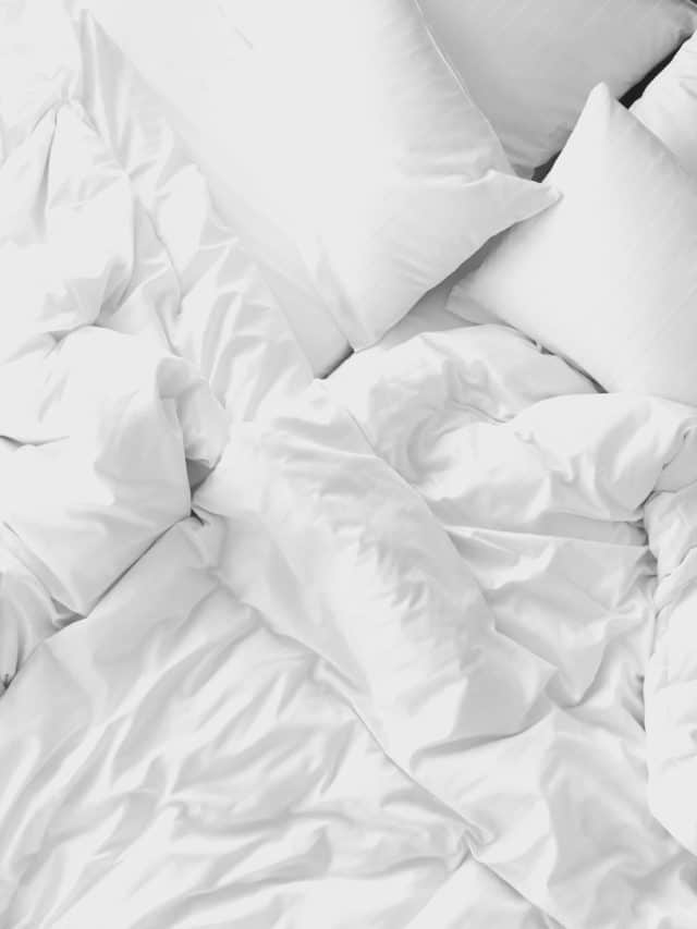 white bedding and pillows