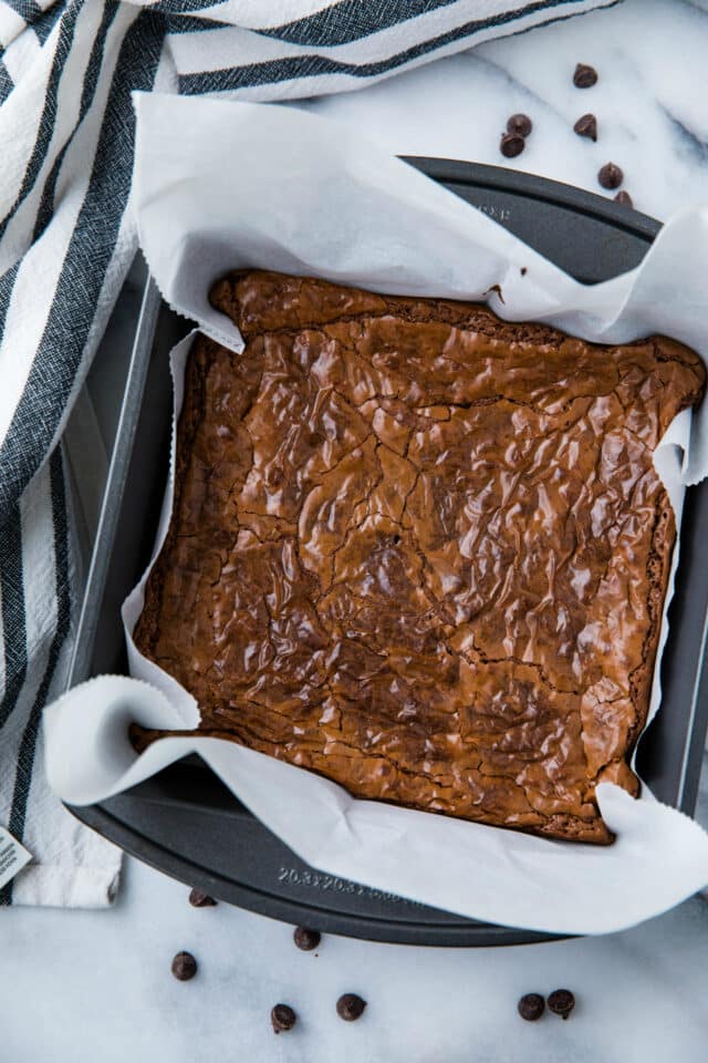 crackly top brownies in a square metal baking pan