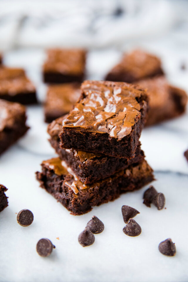 three crackly brownies stacked up