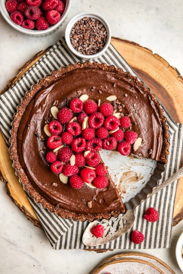 Chocolate Raspberry Tart with one slice cut out
