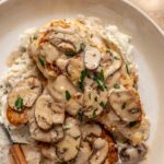Chicken Marsala served over mashed potatoes.