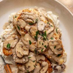 Chicken Marsala served over mashed potatoes.