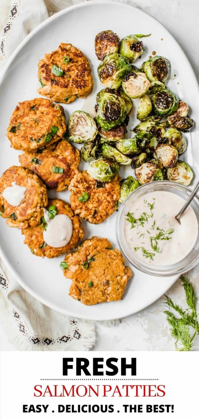 salmon cakes on a large plate with Brussels sprouts
