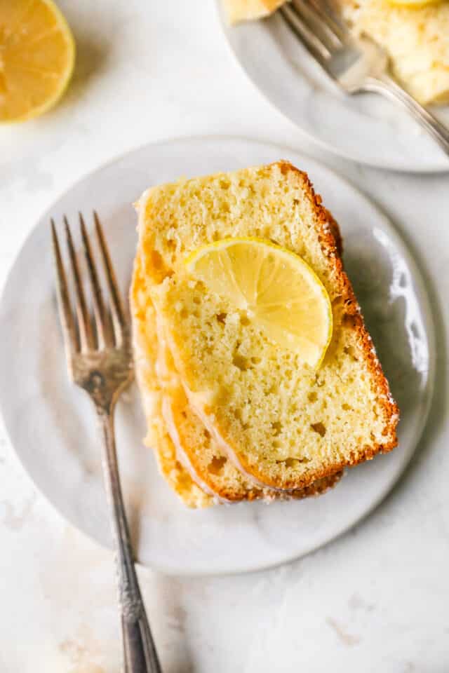 slice of lemon pound cake garnished with a slice of lemon