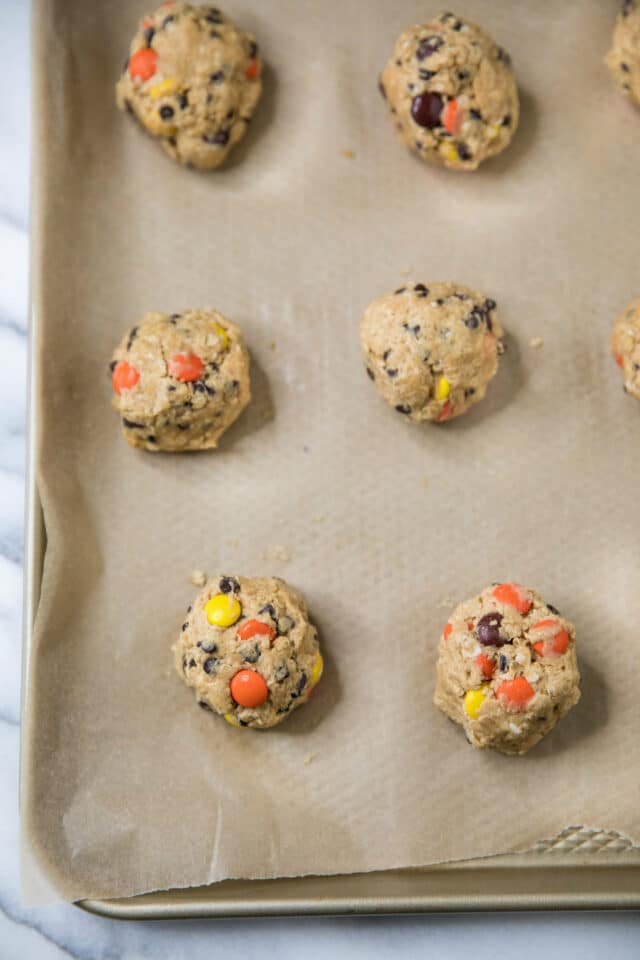 monster cookie dough on a baking sheet 