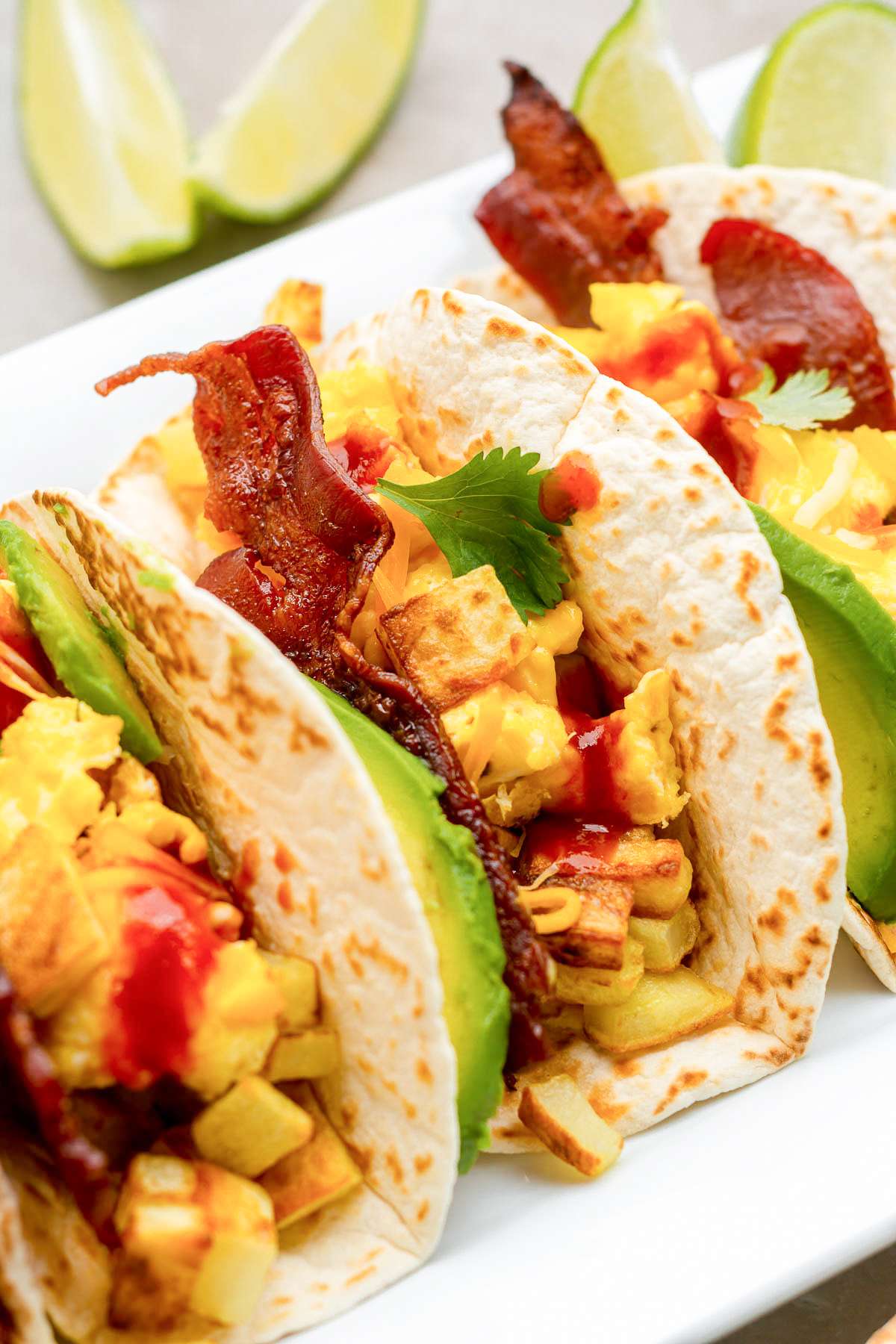 Tacos with bacon, eggs and potatoes.