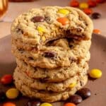 Stacked peanut butter Reese's cookies with a bite out of the top one.