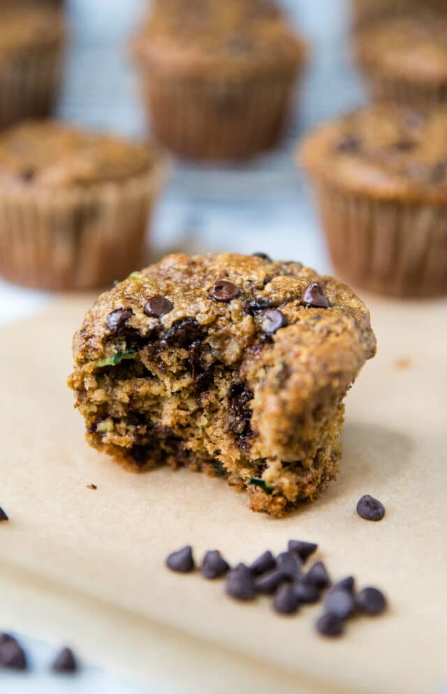 Healthy Chocolate Chip Banana Zucchini Muffins with a bite taken out