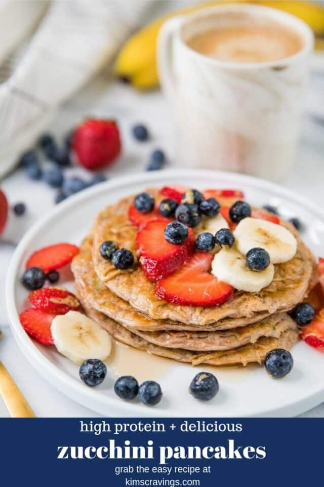Protein Zucchini Pancakes topped with fruit, almond butter and maple syrup