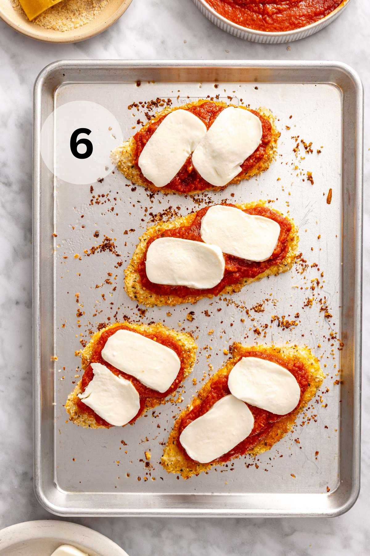 Chicken topped with marinara sauce and mozzarella.