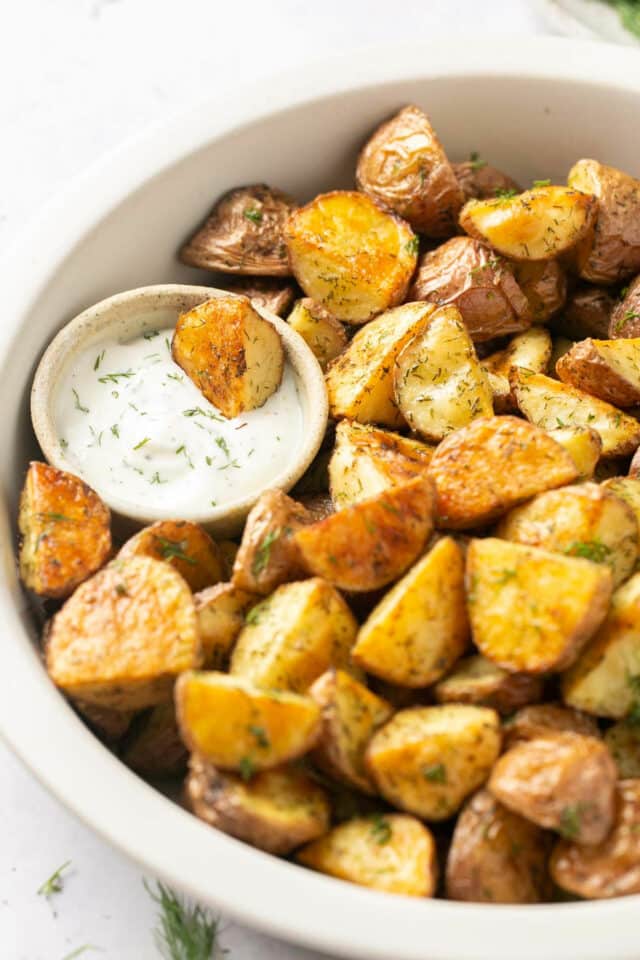 Baby potatoes served with ranch dressing.