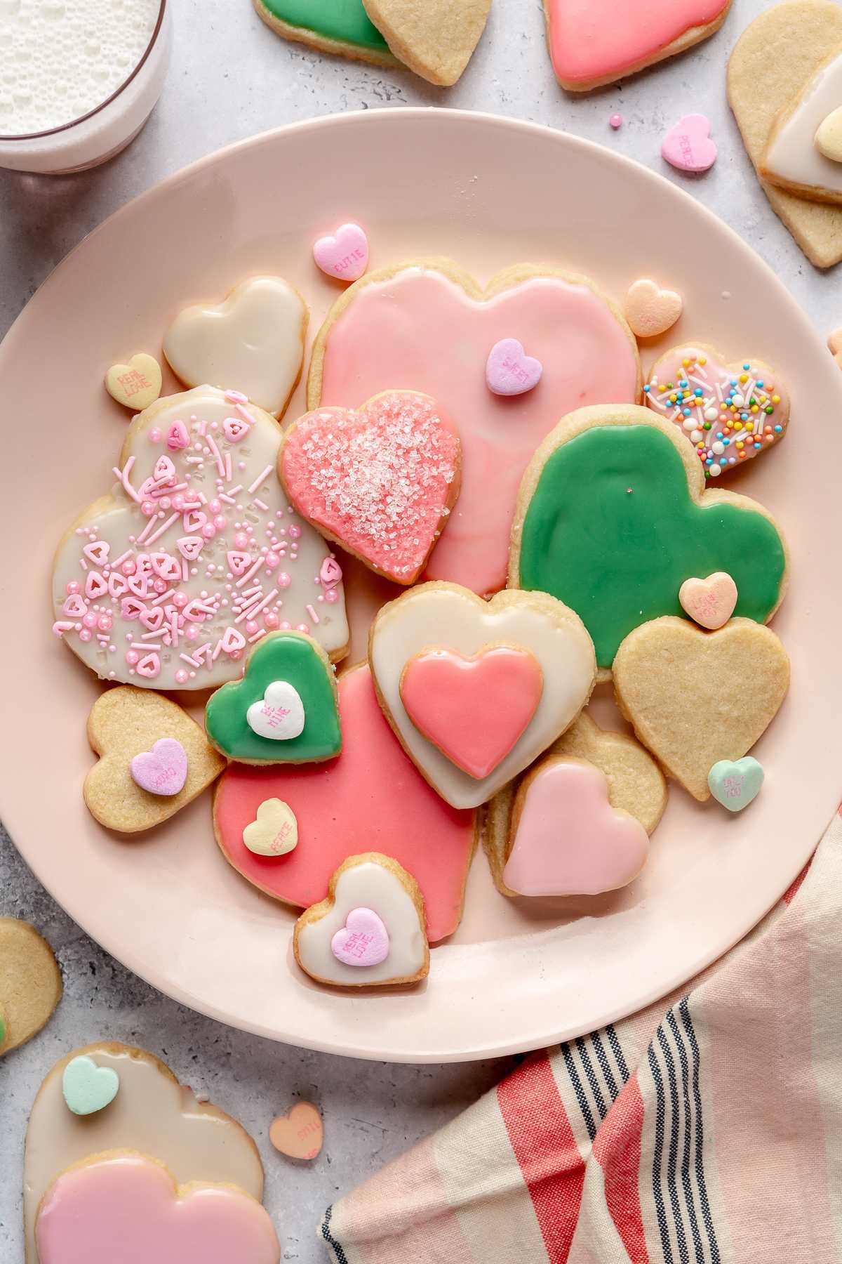 Heart shaped sugar cookies on a plate.