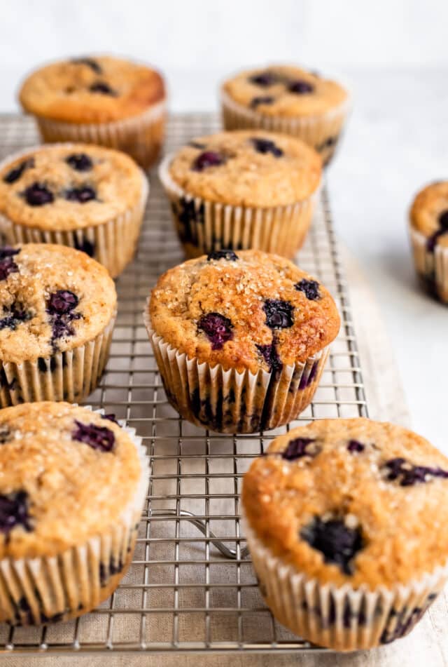 Buttermilk Blueberry Muffins on a wire cooling rack 