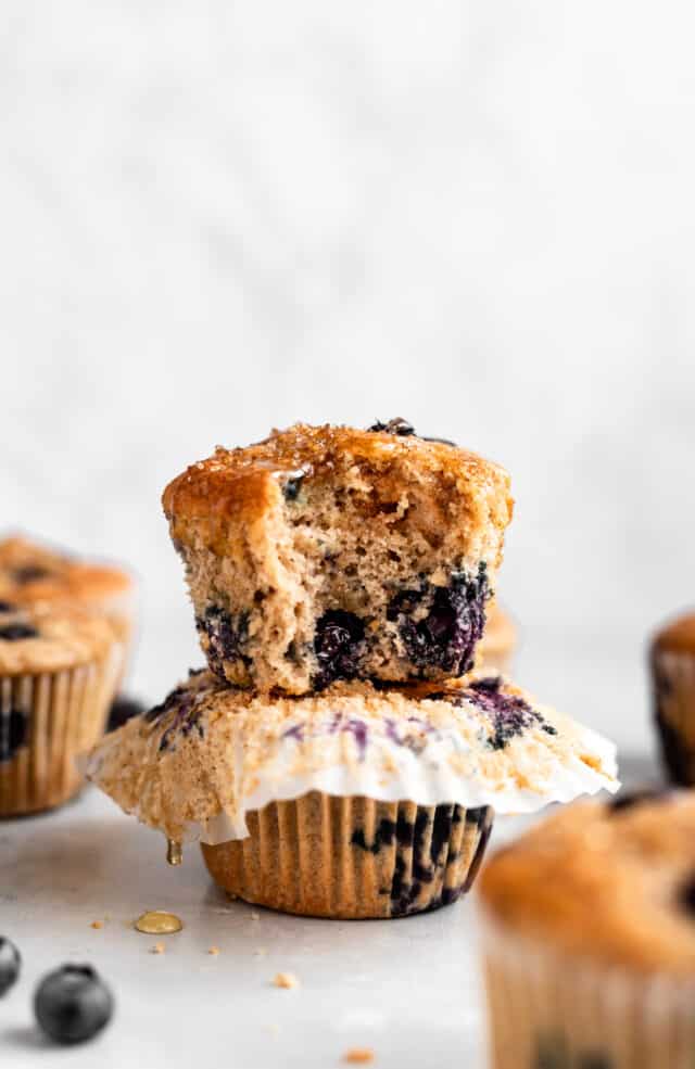 Buttermilk Blueberry Muffins stacked on top of each other