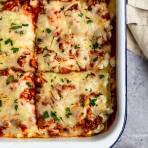 easy healthy lasagna cut into large squares for serving