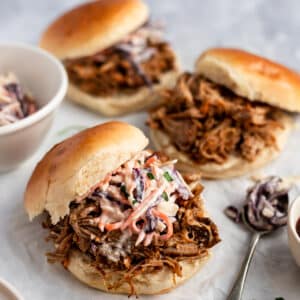 pulled pork sandwiches topped with creamy coleslaw