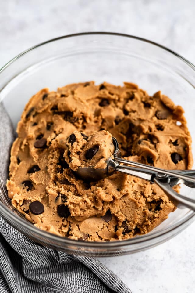 Best Chocolate Chip Cookie Recipe mixed in a glass mixing bowl