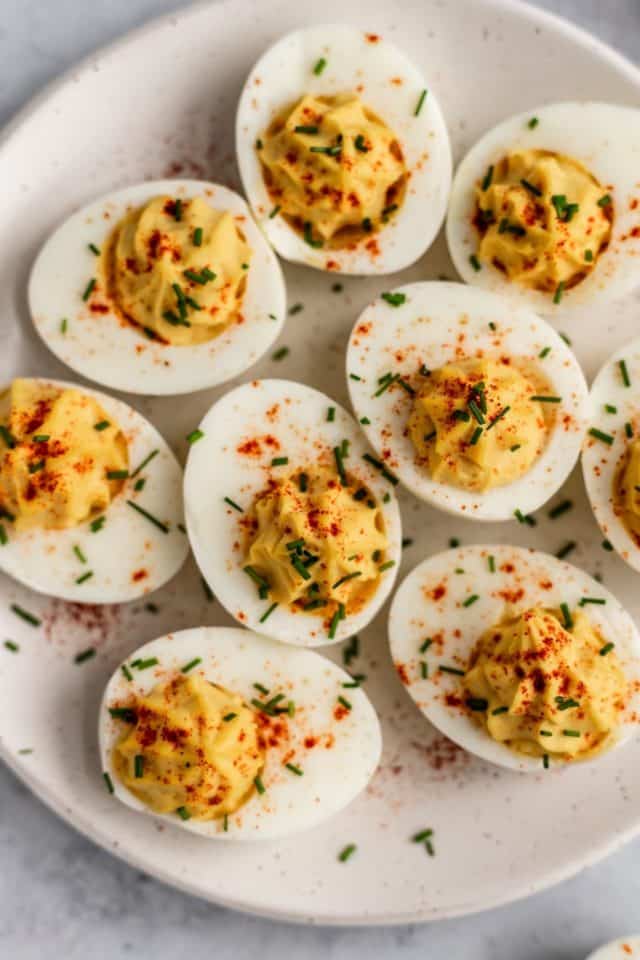 best deviled eggs recipe garnished with paprika and chives