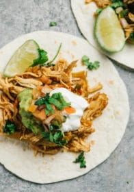 shredded chicken fajita topped with guacamole, sour cream and pico