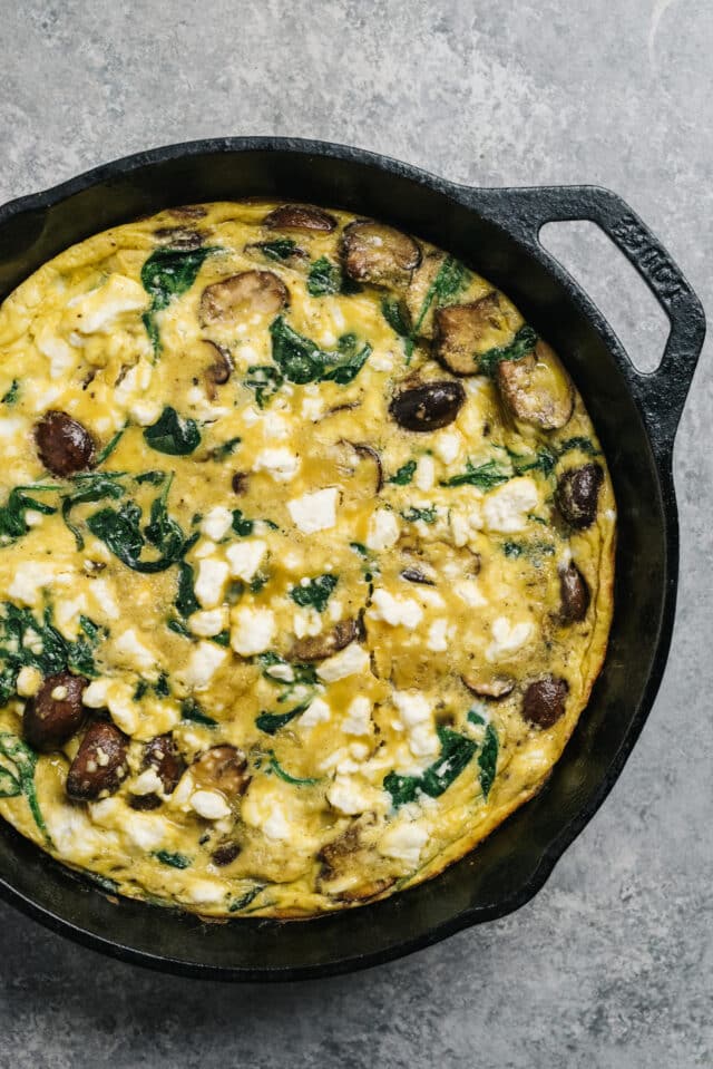 cooked frittata in a cast iron skillet