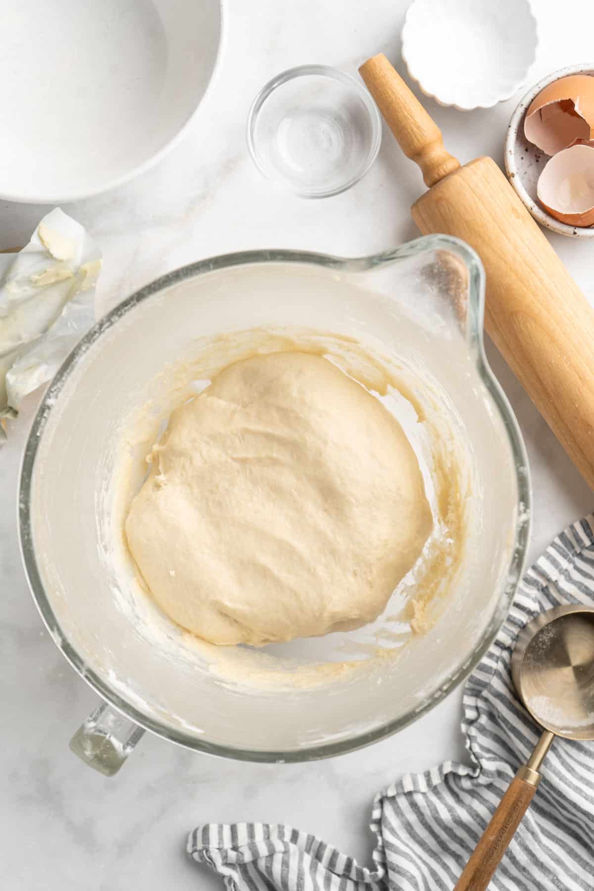 Kneaded dough in a large bowl.