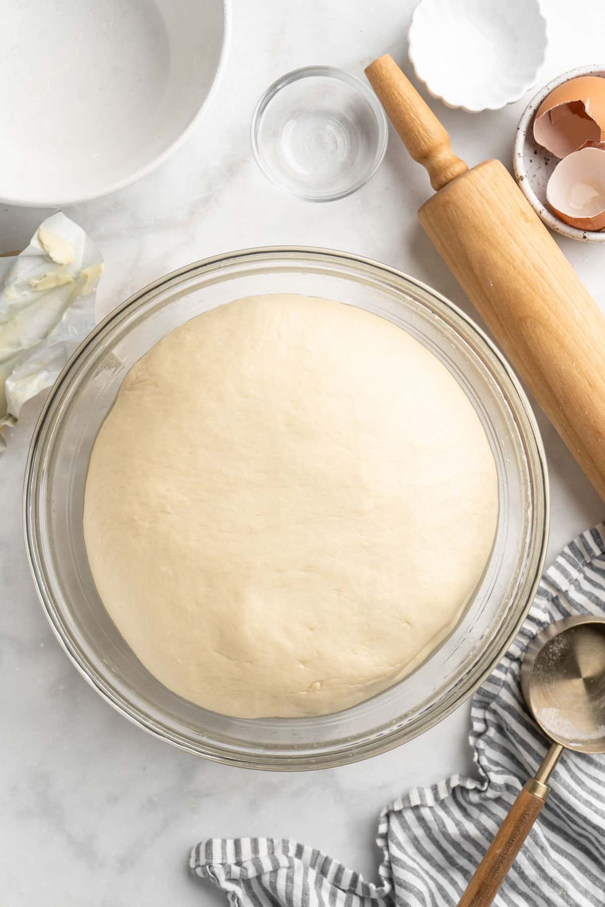 Dough that has risen in a large bowl.